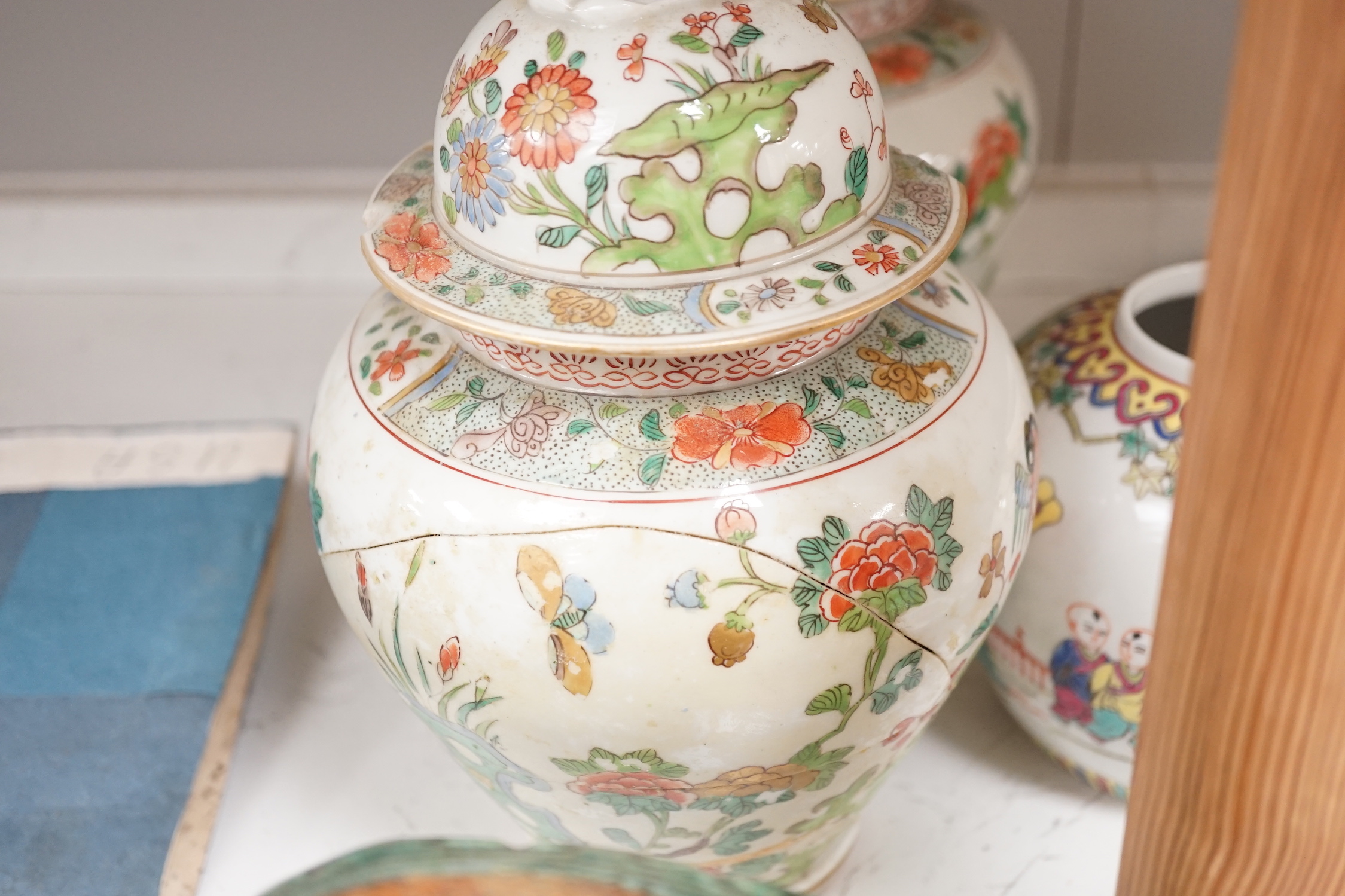 A group of mostly Chinese and Japanese ceramics, 18th century and later together with a Delft plate, tallest 30cm